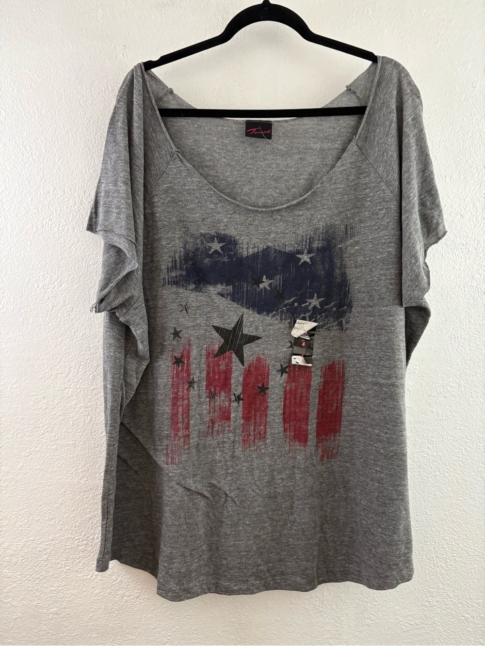 Torrid top is a grey graphic tee distressed, vintage-style American flag size 4X